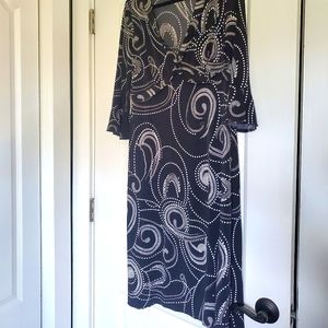 Black and white bell sleeve tea length dress